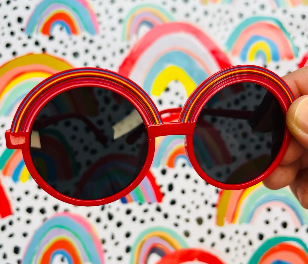 Premium AI Image | Red sunglasses on blue background